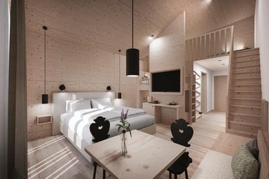 Sitzbereich in der 2 Raum Suite mit Sesseln, Kaffeemaschine und Wasserbar im Familienhotel Gorfion in Lichtenstein.