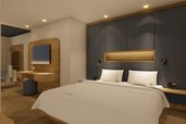 Visualisierung des neuen Elternschlafbereichs im Familienhotel Zauchenseehof mit modernem Holzdesign, gemütlicher Beleuchtung und stilvollen Details.