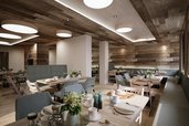 Der Speisesaal Garselli im Familienhotel Gorfion in Liechtenstein mit gedeckten Tischen im neuen Restaurant.
