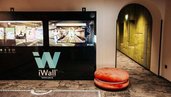 Indoor-Spielbereich mit IWall und gemütlichen Sitzkissen für Action im Familienurlaub im Wellness- & Familienhotel Egger
