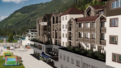 Visualisierung des Familienhotels Zauchenseehof im Sommer mit Blick auf das modernisierte Gebäude und den angrenzenden Spielbereich vor der Bergkulisse.