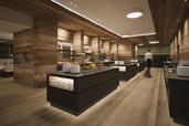 Der Speisesaal Buffet im Familienhotel Gorfion in Liechtenstein mit Buffetbereich und Holzdetails im neuen Restaurant.
