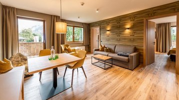 Gemütlich eingerichtete Suite im Familienhotel Das Bayrischzell in Bayern.