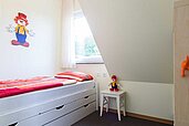 Kinderschlafbereich in einem Familienzimmer des Landhuus Laurenz im Münsterland.
