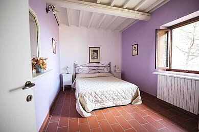 Ferienhaus San Carlo liebevoll eingerichtetes Zimmer im Familienhotel Castellare in der Toskana 