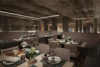 Der Speisesaal Pradame im Familienhotel Gorfion in Liechtenstein mit gedeckten Tischen im neuen Restaurant.