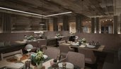 Der Speisesaal Pradame im Familienhotel Gorfion in Liechtenstein mit gedeckten Tischen im neuen Restaurant.
