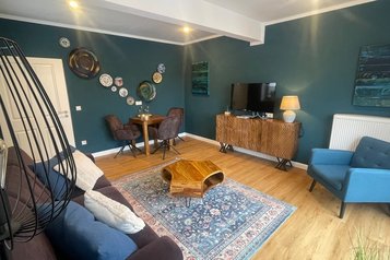 Wohnbereich von einem Zimmer im Familienhotel Gut Landegge.