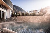 Outdoor-Pool im Familienhotel Alpenhof Dolomit Family
